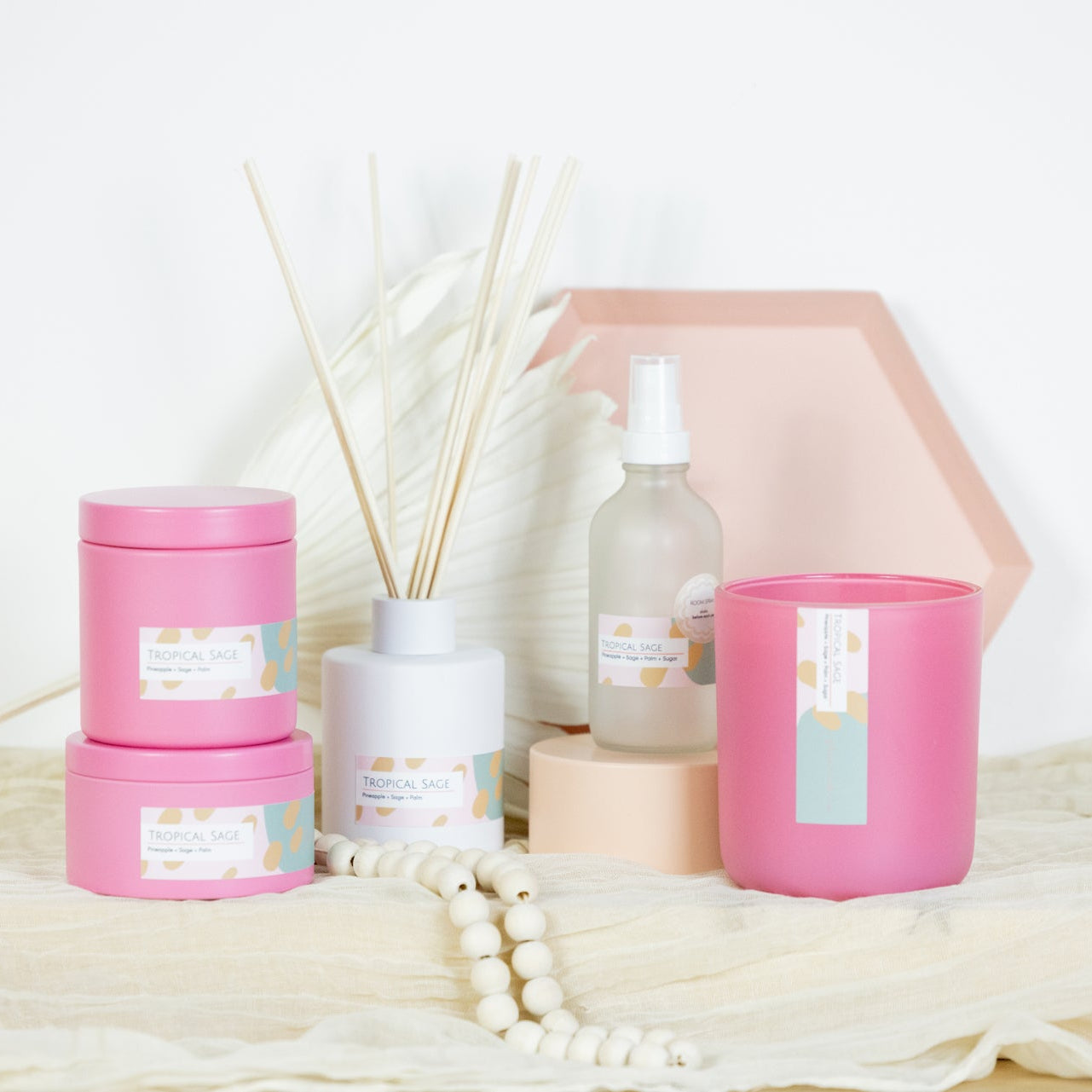 Set of pink and white decorative items on a light background & decor