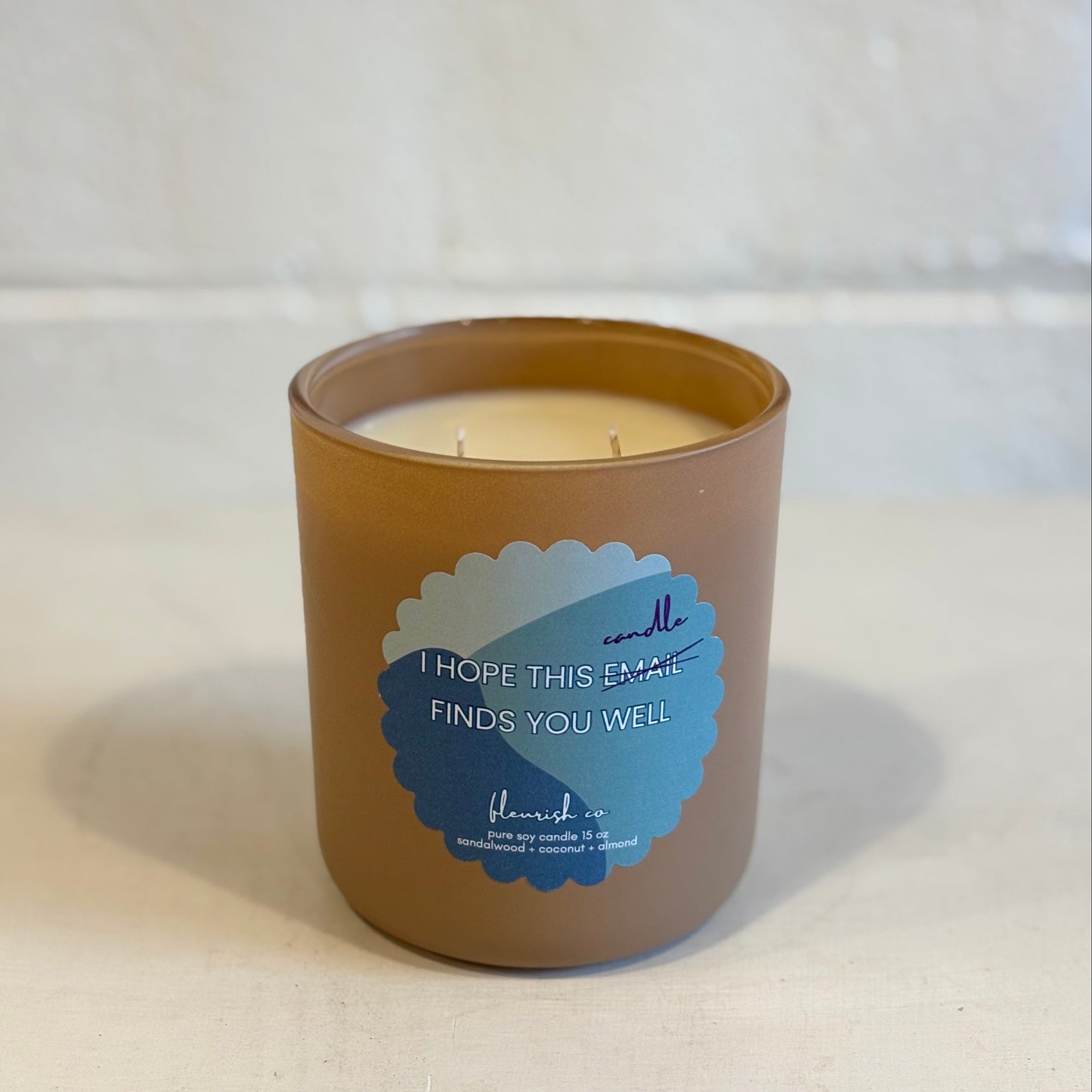 I hope this candle finds you well label on taupe candle jar