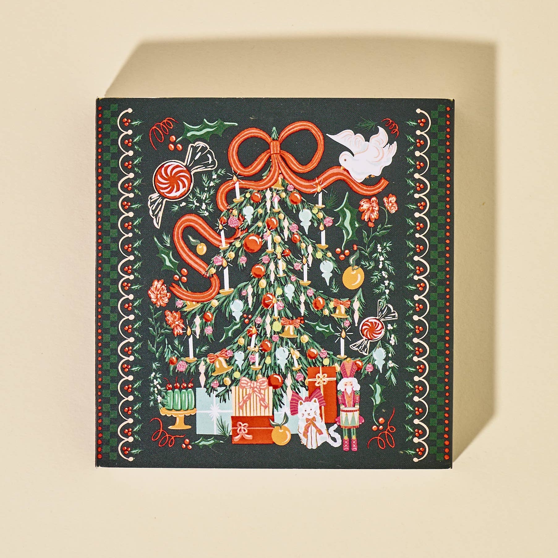 Decorative box with festive design on a beige background